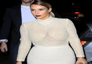 Kim Kardashian Sahalara Sütyensiz Döndü!