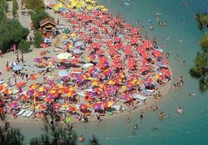 Antalya da plaja  donla girilmez  kuralı getirildi!