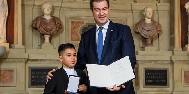 Almanya da 10 yaşındaki Kenan a kahramanlık madalyası