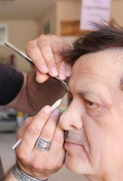 Topladığı saçlarla Cumhurbaşkanı'nın heykelini yaptı - 1. fotoğraf