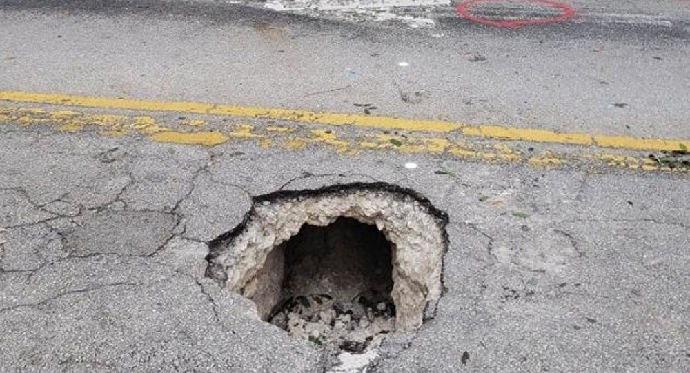 Obruk sanılan çukur, bankaya kazılan tünel çıktı