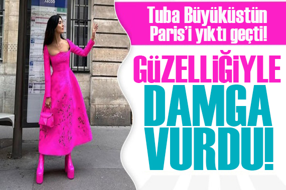 Tuba Büyüküstün Paris teki defileye güzelliğiyle damga vurdu