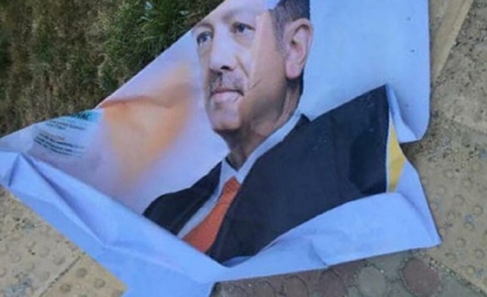 Erdoğan ın afişlerini yırttı, gözaltına alındı