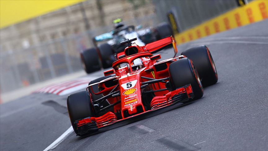 Singapur da zafer Vettel in