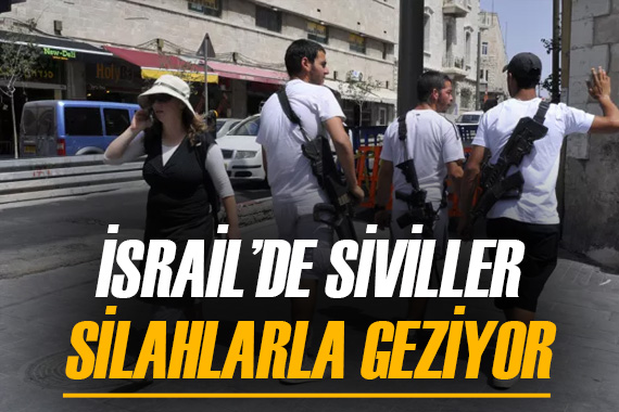 İsrail de halk sokaklarda silahlarla dolaşıyor! Ruhsat için bekleyen binler var