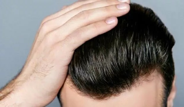 Koronavirüste bir risk daha: Saçlarınıza dokunmayın!